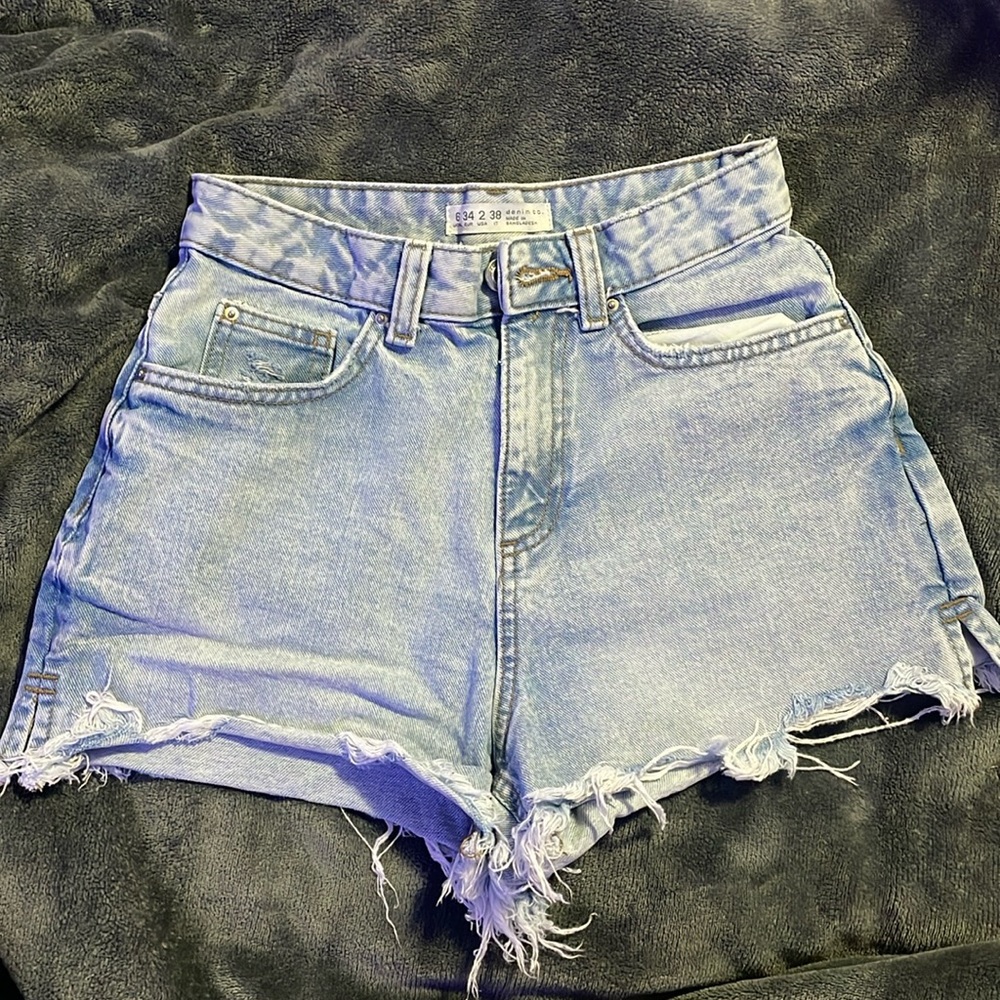 High waisted distressed denim jeans